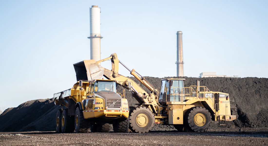 CAT 988H Loading Dirt Onto Bulk Dump Truck, Intermodal Division