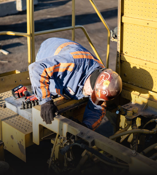 Bulk Team Member Repairing Equipment