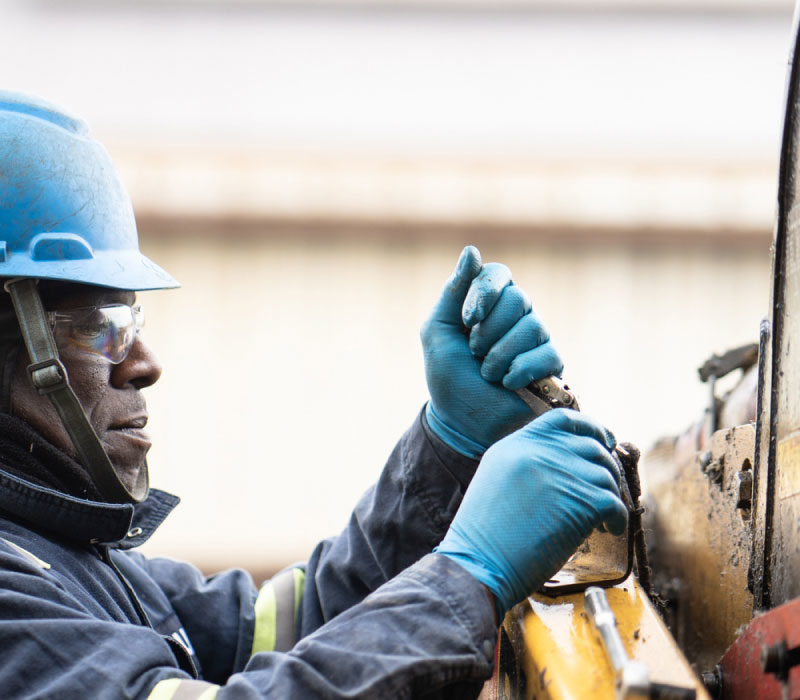 Bulk Team Member in Action Wearing Hard Hat, Safety Glasses & Gloves