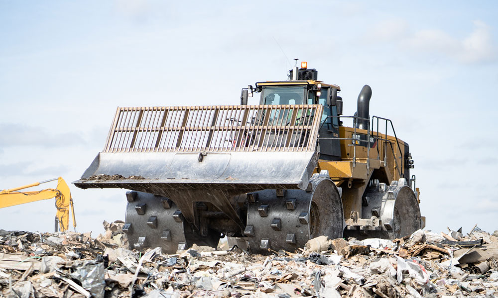 Cat® 836h Landfill Compactor Belly Guard At Job Site