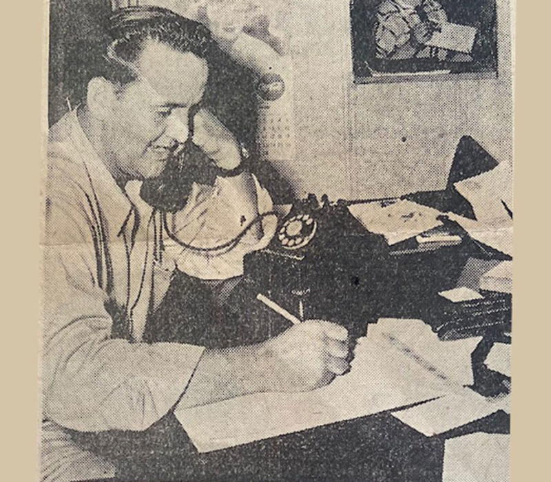 Leonard Brown Back In The Day Talking On The Dial Phone And Taking Notes On A Notepad