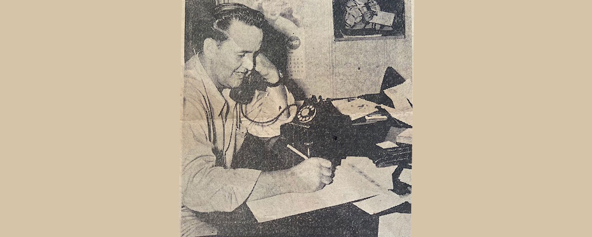 Leonard Brown Back In The Day Talking On The Dial Phone And Taking Notes On A Notepad