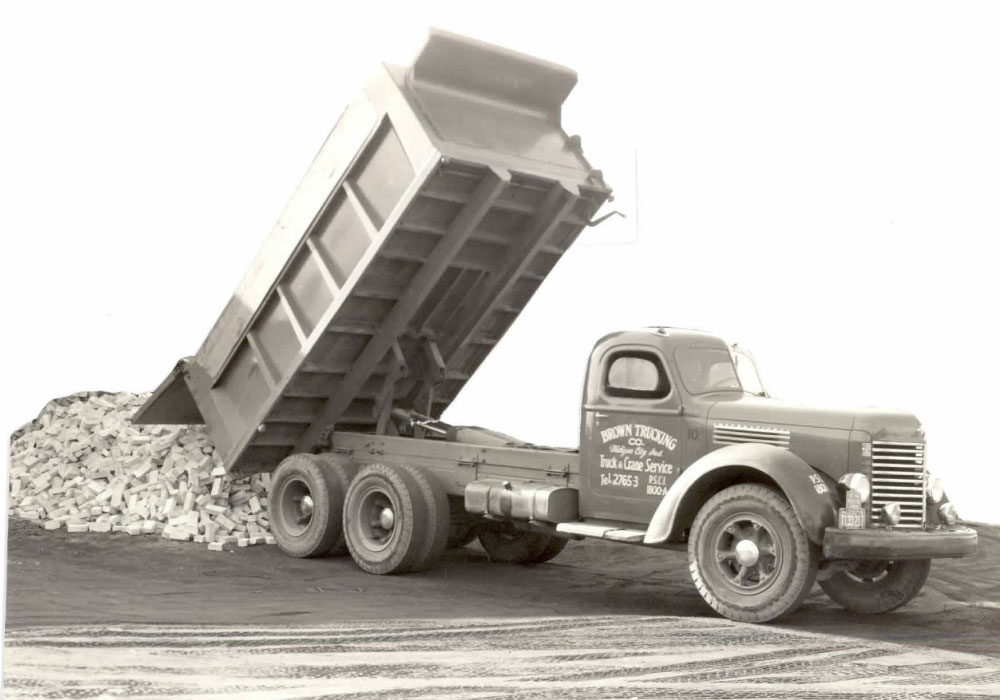 Brown Trucking Unloading Material