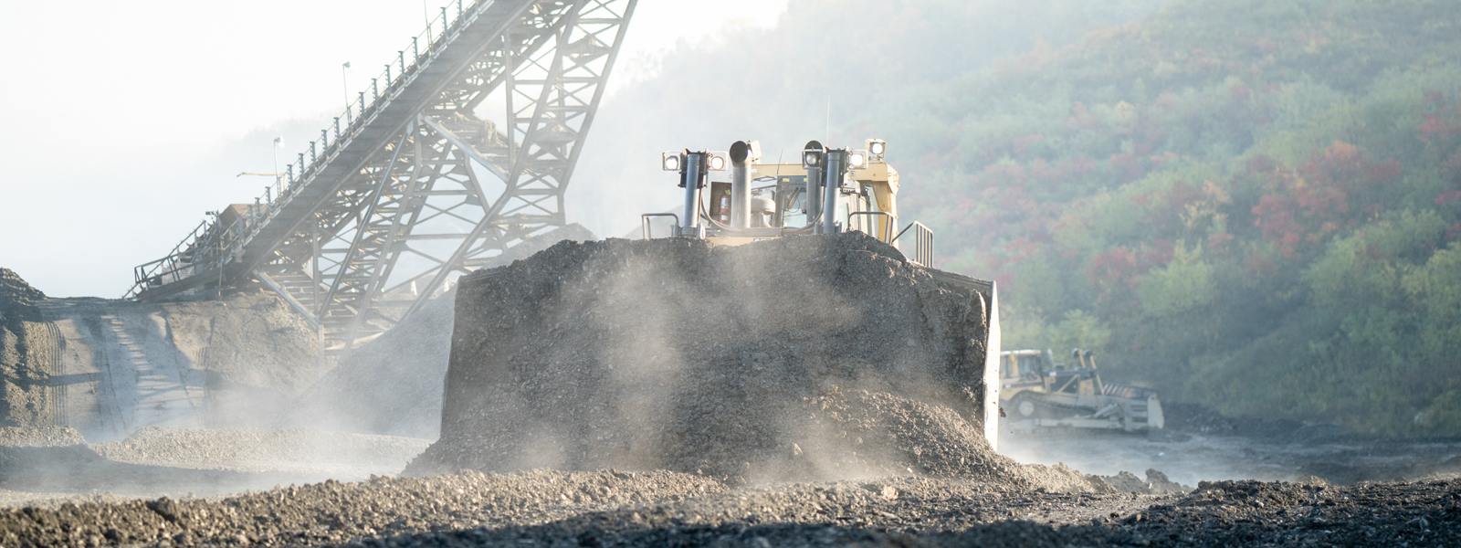 Bulldozer Moving Dirt At Mining/quarry Site