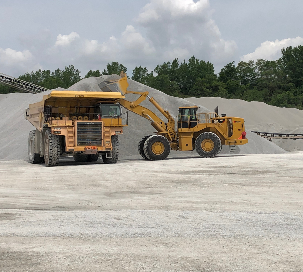 Cat® Bulldozer Rental Loading Material Onto Dump Truck